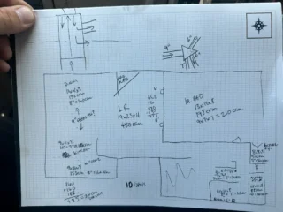 Hand-drawn HVAC system diagram showing ductwork layout, equipment specifications, and measurements for a Mesquite home cooling assessment