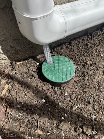 Condensation Drain with pea gravel to prevent pooling water