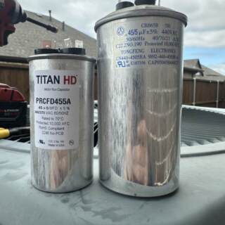 Old Capacitor next to new capacitor