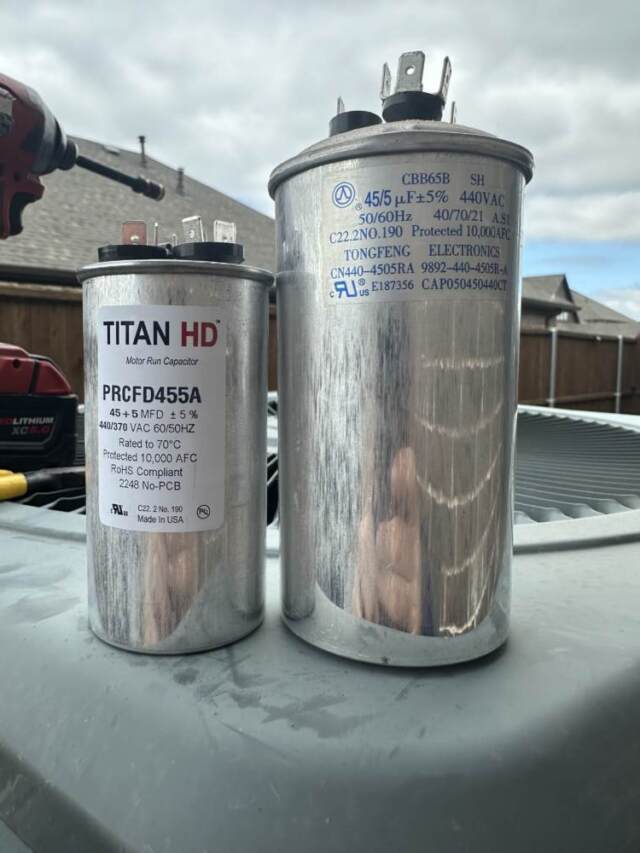 Old Capacitor next to new capacitor