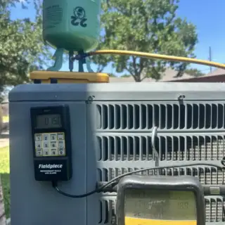 Recharged the system to restore proper cooling performance.