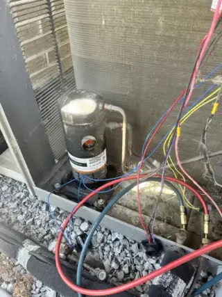 Compressor had grounded out because of a power surge